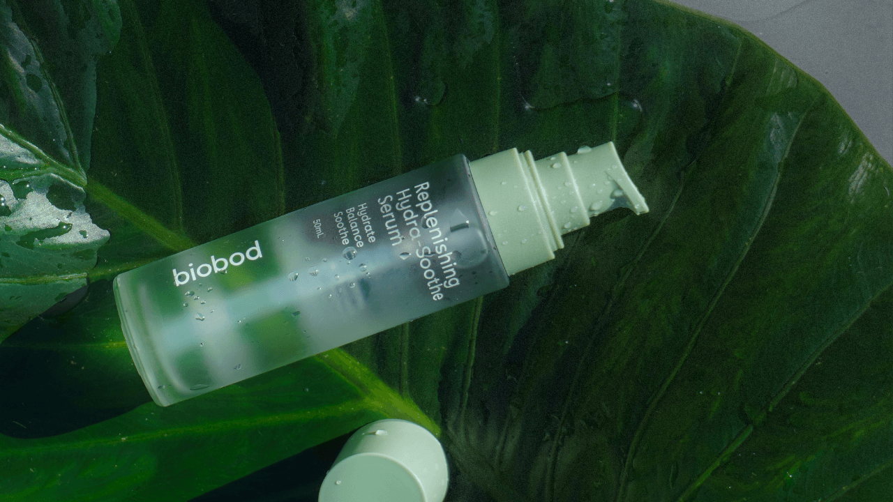 Biobod serum bottle on a green leaf background